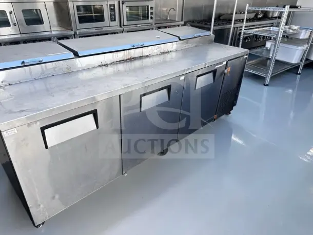 True TPP-93 refrigerated pizza prep table, 93", three doors, 12 pan capacity, excellent condition, fully tested.