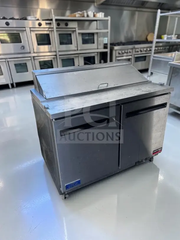 Arctic Air AST48RZ 48" two-door refrigerated prep table, 12-pan capacity, fully operational, stainless steel.
