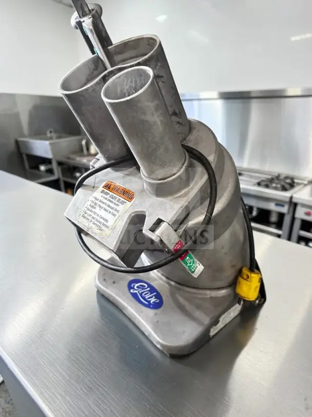 Globe GFP500 food processor and vegetable cutter, 600 lb/hr capacity, 1/2 HP, 115V, fully operational, superior condition.