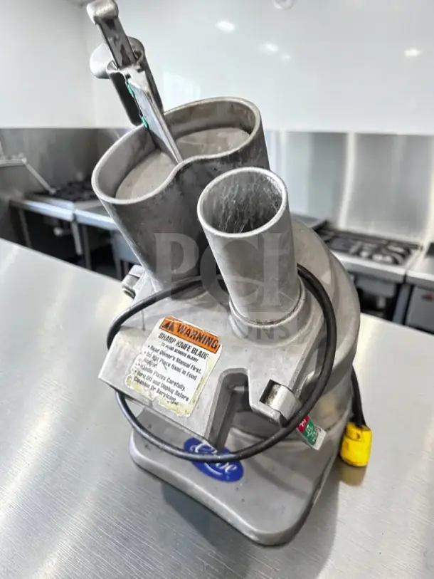 Globe GFP500 commercial food processor, superior condition, 600 lb/hr, 1/2 HP, 115V, fully tested, visible caution label.
