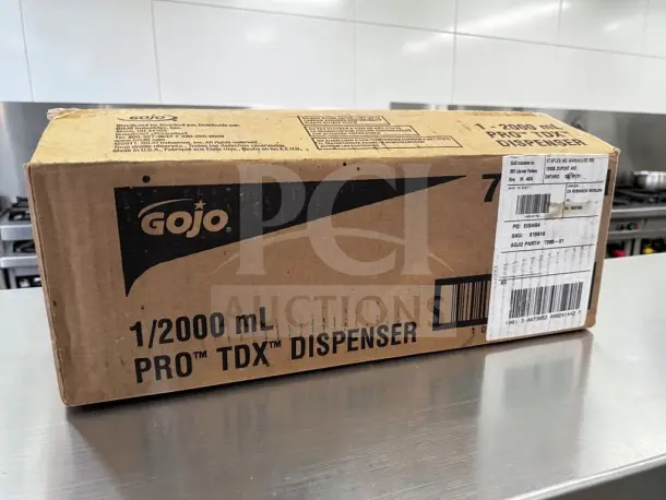 GOJO 7200-01 PRO TDX 2000 dispenser box, new, 2,000 mL capacity, wall-mount, immaculate condition, ready for installation.