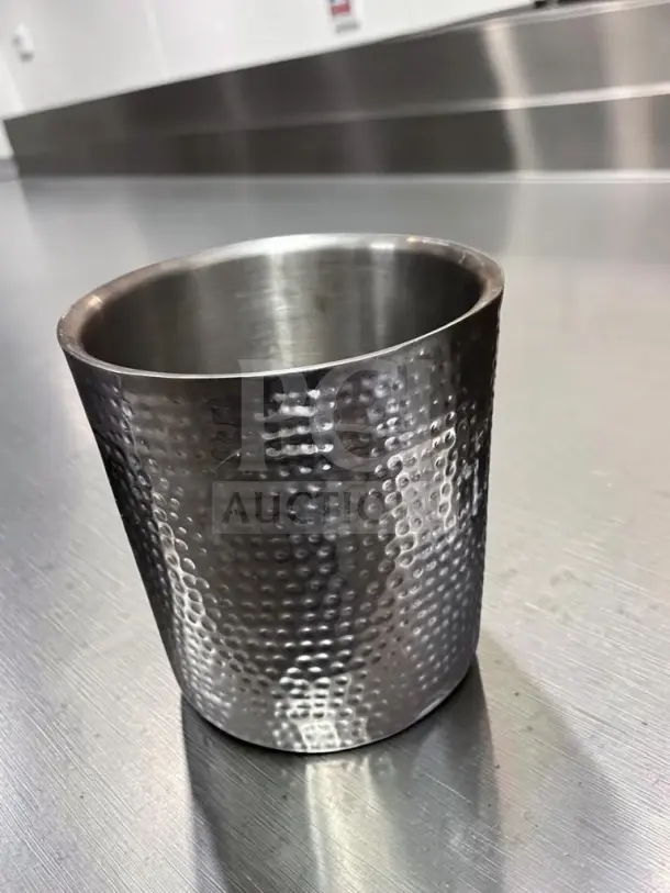 Hammered silver-finish metal container, 12.25" round, open-top decorative vessel. Excellent condition, inspected for use.
