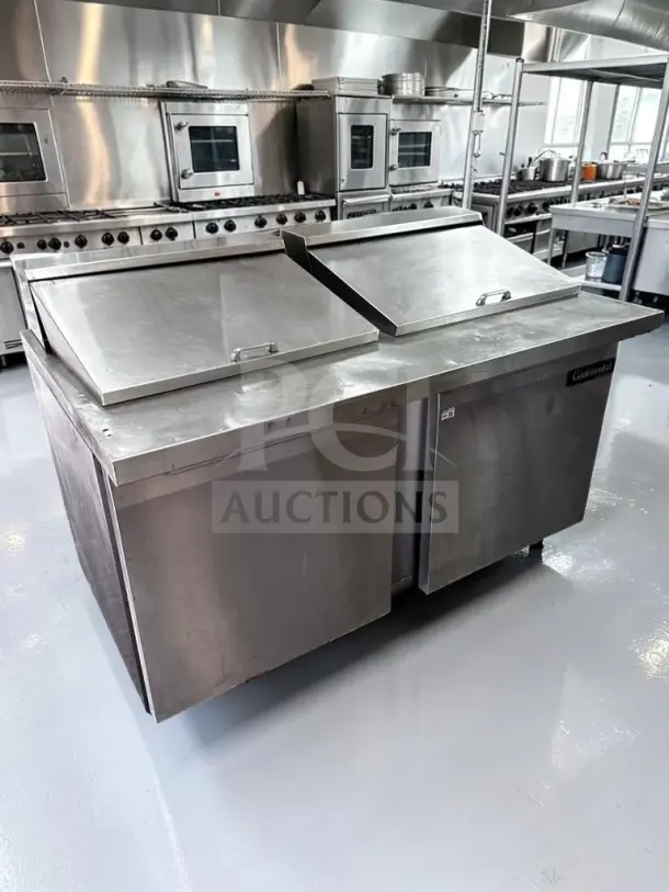 Continental DL60-24M 60" two-door refrigerated sandwich prep table, superior condition, fully tested, 17 Cu. Ft. capacity.