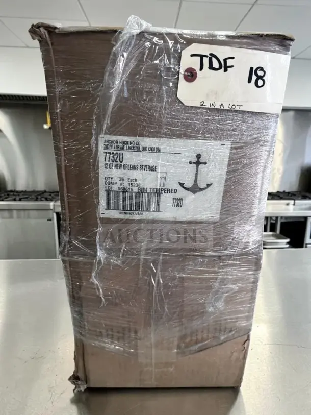 Box of Anchor Hocking 7732U beverage glasses, 12 oz, rim-tempered, new in original packaging, ready for commercial use.