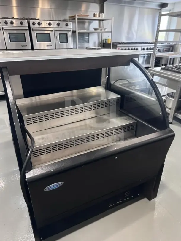 Federal Industries UCR3633C 36" curved-end refrigerated display case, used, high-grade condition, 120V, black exterior.