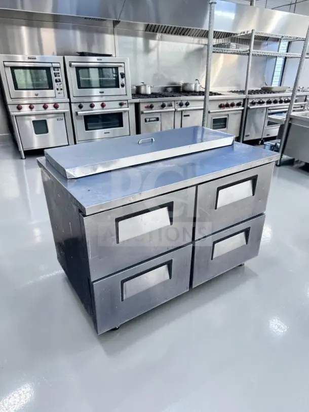 True TSSU-48-12D-4 sandwich prep table with four drawers, 12-pan top, stainless steel, superb condition, fully tested.