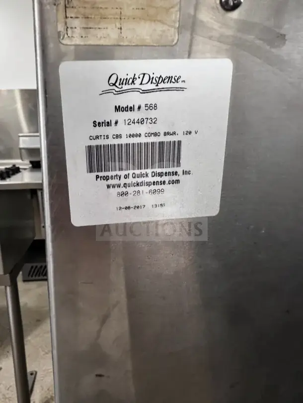 Wilbur Curtis CBS10000 Commercial G3 Coffee, Iced Coffee, and Tea Brewer, 120V, label with model and serial number info.