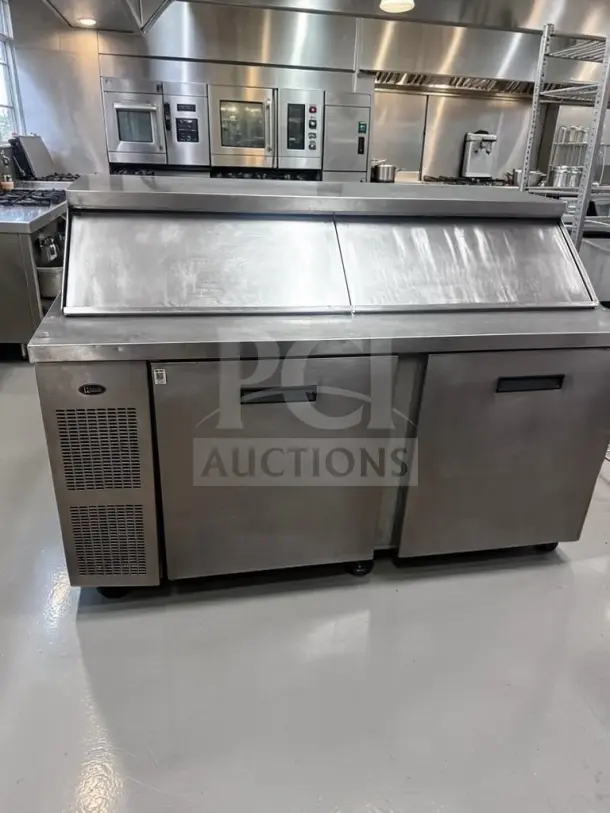 Randell 9040K-7 60" two-door prep table, superior condition, 24-pan capacity with refrigerated top, fully tested.