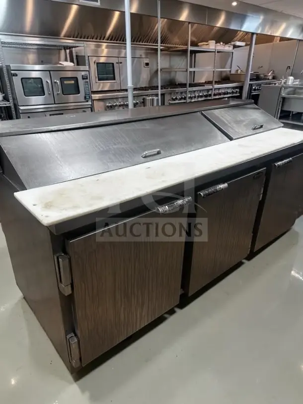 Beverage-Air SP72-18 prep table with three doors, 18-pan refrigerated top, stainless steel, fully tested, operational.