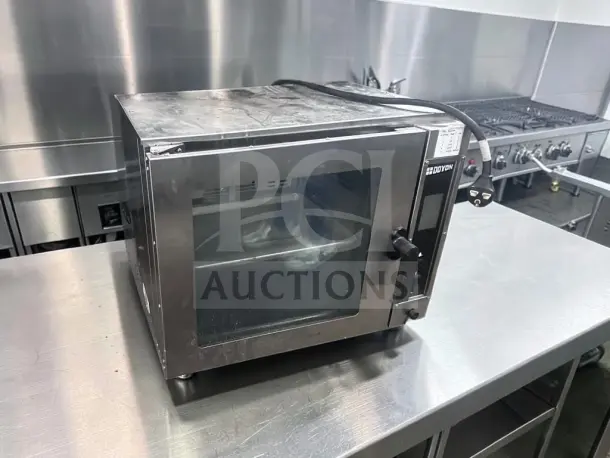 Doyon DCOT5 electric countertop half-size convection oven, superior condition, 208V, single-phase, ETL/NSF certified.