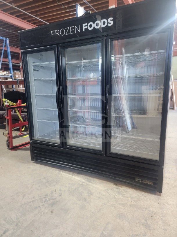 True GDM-72F-HC commercial 3-door glass merchandiser freezer, tested and working, ideal for stores and kitchens.