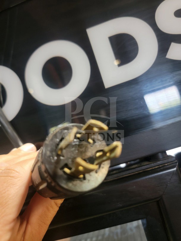 Close-up of True GDM-72F-HC freezer plug showing intact prongs; professional-grade, tested and working condition.