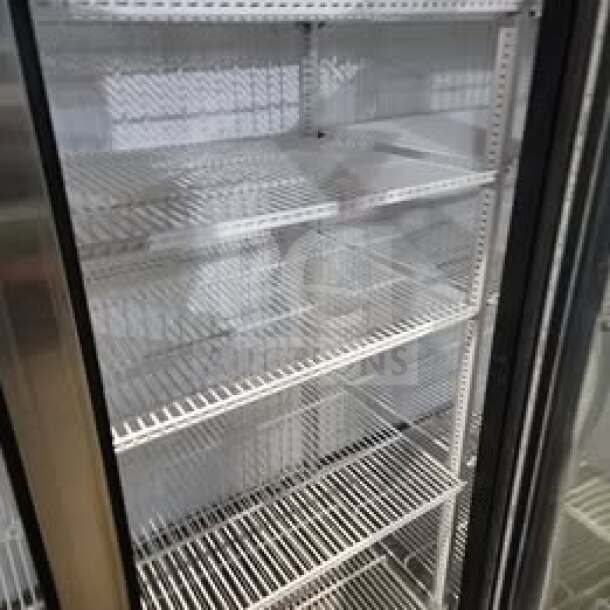 2018 True GDM-72F-HC 3-Door Glass Merchandiser Freezer, professional-grade, tested, working, ideal for commercial use.