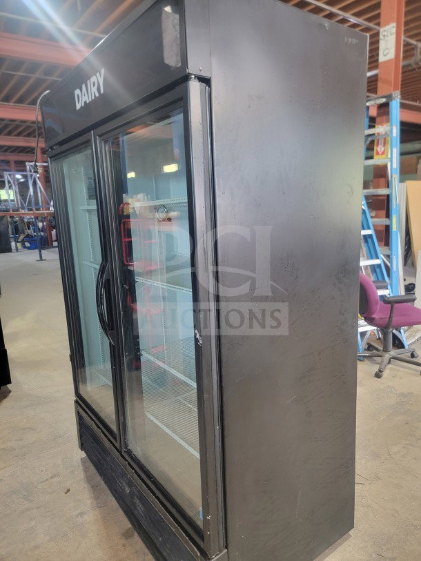 True GDM-49-HC 2-Door Glass Merchandiser Refrigerator. Tested, fully working. Ideal for commercial use; features "Dairy" label.