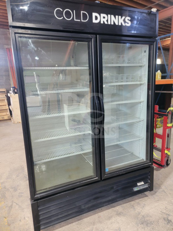 True GDM-49-HC 2-door glass refrigerator, excellent condition, branded "COLD DRINKS," serial 9596595, fully functional.