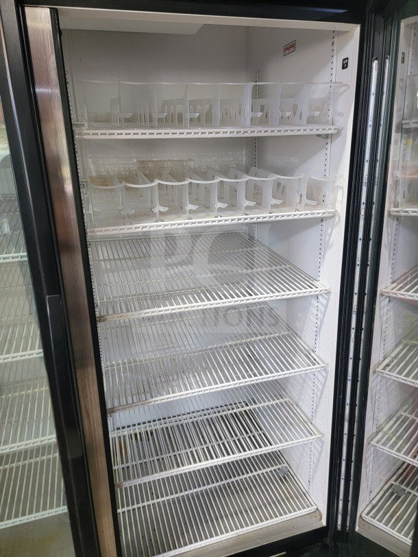 True GDM-49-HC 2-door glass merchandiser refrigerator, tested, working, high-capacity shelves, ideal for commercial display.
