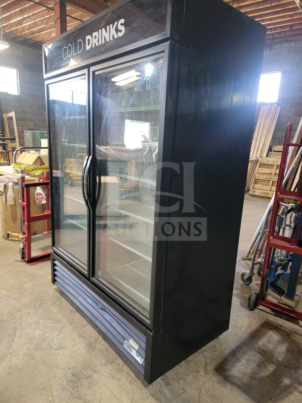 True GDM-49-HC 2-door glass merchandiser refrigerator, excellent condition, tested, ideal for commercial use.