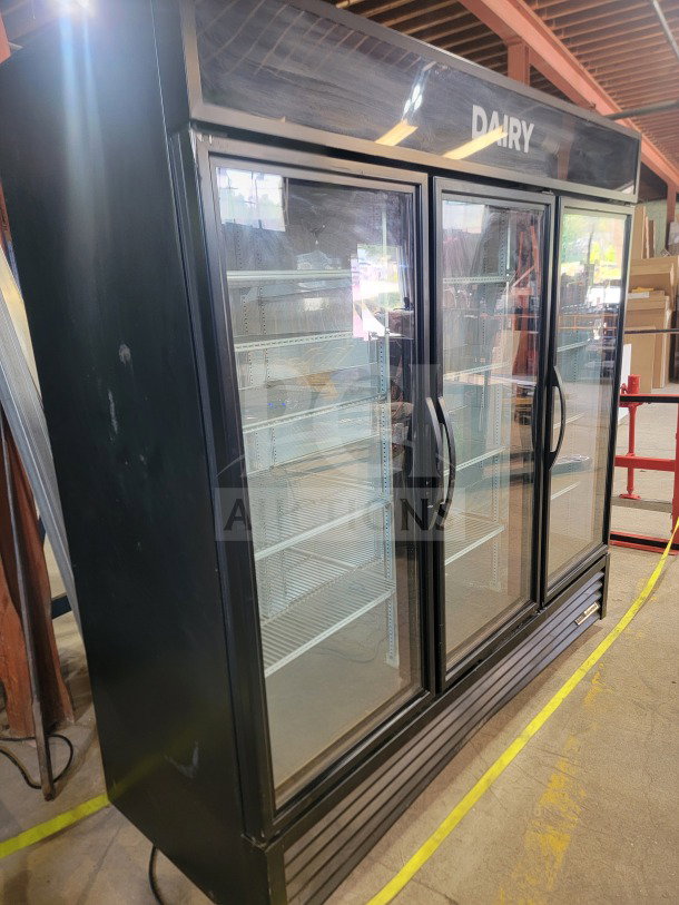 True GDM-72-HC 3-door glass merchandiser refrigerator, black, tested and working, ideal for commercial display of dairy and beverages.