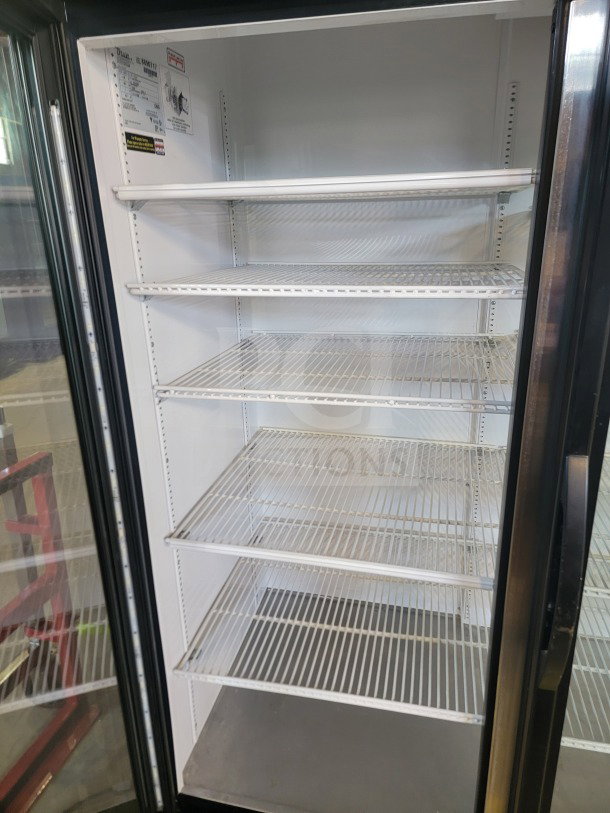 True GDM-72-HC 3-door glass merchandiser refrigerator, commercial-grade, white interior, adjustable shelves, tested and working.
