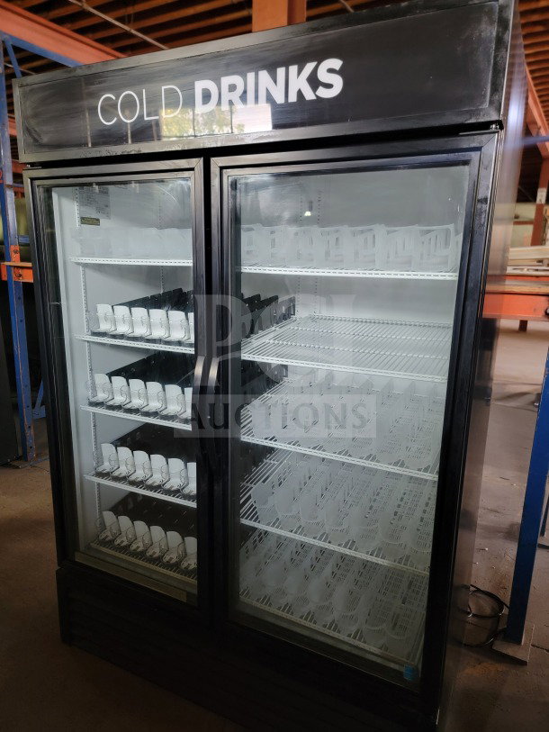 True GDM-49-HC 2-door glass merchandiser refrigerator, "COLD DRINKS" label, tested and working, ideal for commercial use.