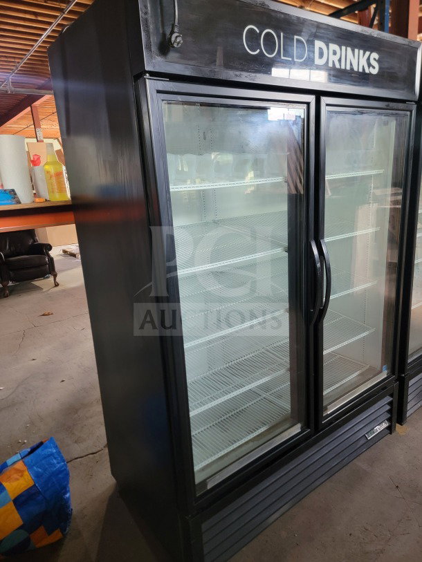 True GDM-49-HC 2-door glass merchandiser refrigerator, black, tested, fully working, ideal for commercial display.