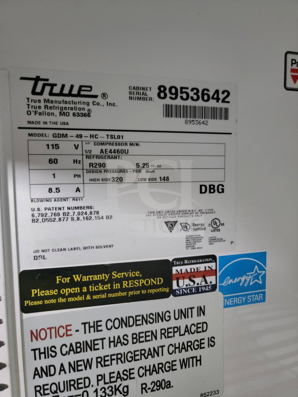 True GDM-49-HC refrigerator label, showing model, serial number 8953642, voltage, refrigerant type R290, and warranty info.