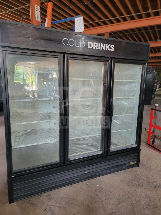 True GDM-72-HC glass merchandiser refrigerator, 3-door, tested working, black frame, ideal for commercial display.