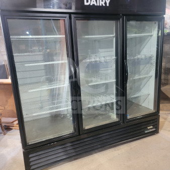 True GDM-72-HC 3-door glass merchandiser refrigerator, black, labeled "Dairy," tested, working, ideal for commercial use.