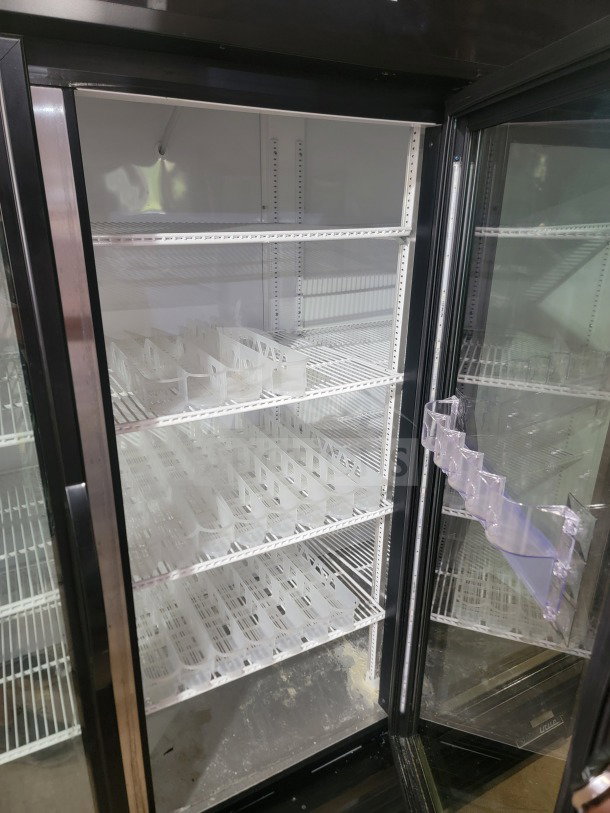True GDM-72-HC Commercial 3-Door Glass Merchandiser Refrigerator, excellent condition, tested and working, spacious interior shelving.