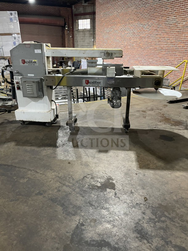 Excalibur S/90 commercial stainless steel bagel divider, floor style, on casters, 220V, in used condition.