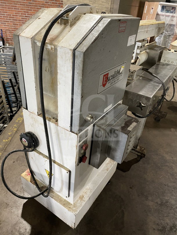 Excalibur S/90 Bagel Divider/Former, stainless steel, commercial floor model, on casters, 220V, used condition.