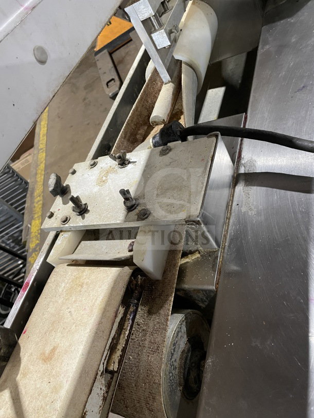 Excalibur S/90 commercial stainless steel bagel divider/former on casters, 220V, visible wear, sturdy build.