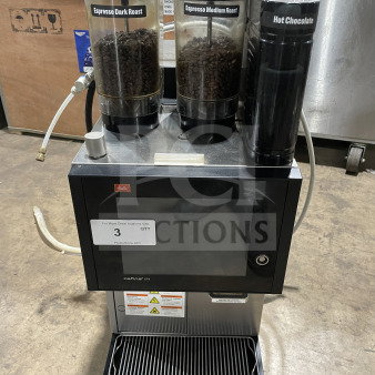 Melitta Cafina CT8-2G-2TF-WO-0-1/S-T S0256 super-automatic espresso machine, stainless steel, 208V, 2 phase, with labeled bean and chocolate containers.