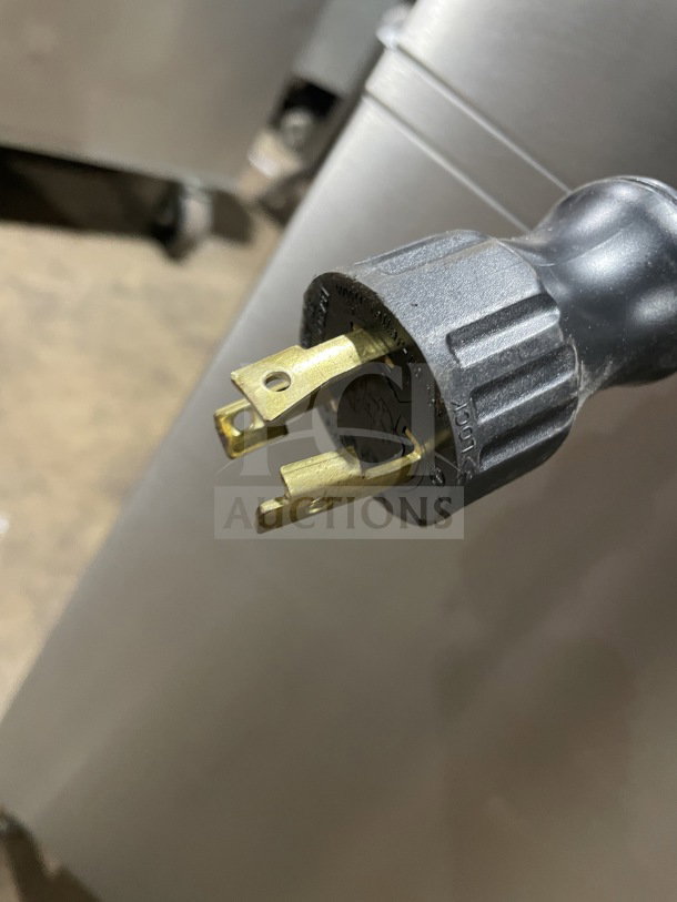 Melitta Cafina Series CT82G2TFWO01/ST commercial espresso machine plug, 208V, 2 phase, stainless steel body detail.