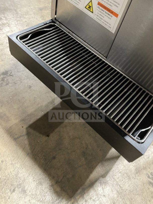 Melitta Cafina CT8 stainless steel espresso machine drip tray, showing detailed grating and condition.