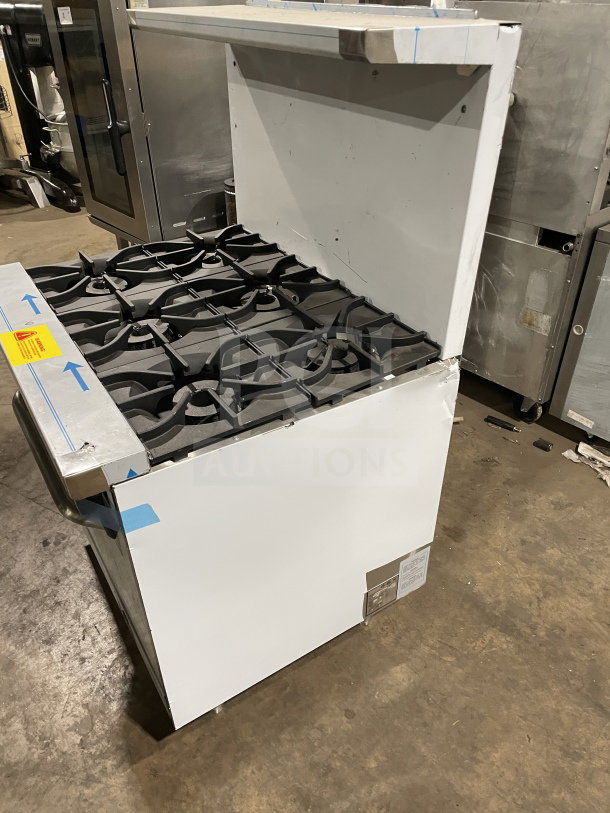 Brand new Kutano 36" 6-burner natural gas range with oven, Model KUT6BRN36NG. Stainless steel, scratch & dent condition.