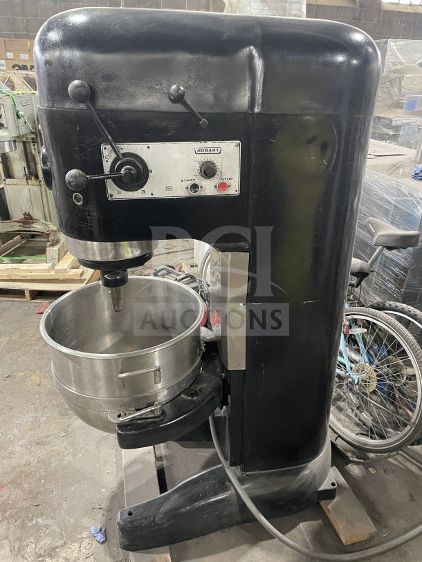 Hobart charcoal black electric planetary dough mixer with mixing bowl and dough hook attachment, good condition.