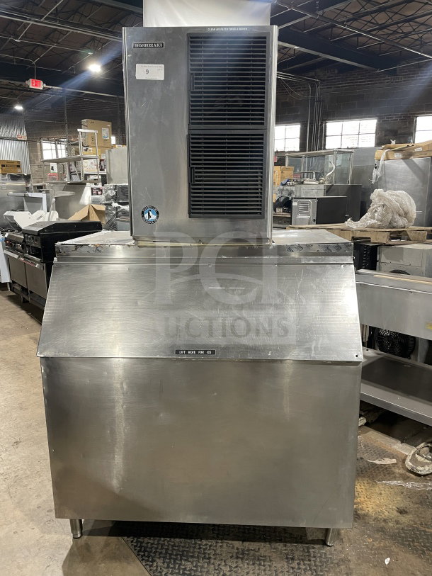 Hoshizaki KM-515MAH commercial ice machine, stainless steel, air-cooled, on legs, visible serial number B04669A, robust condition.