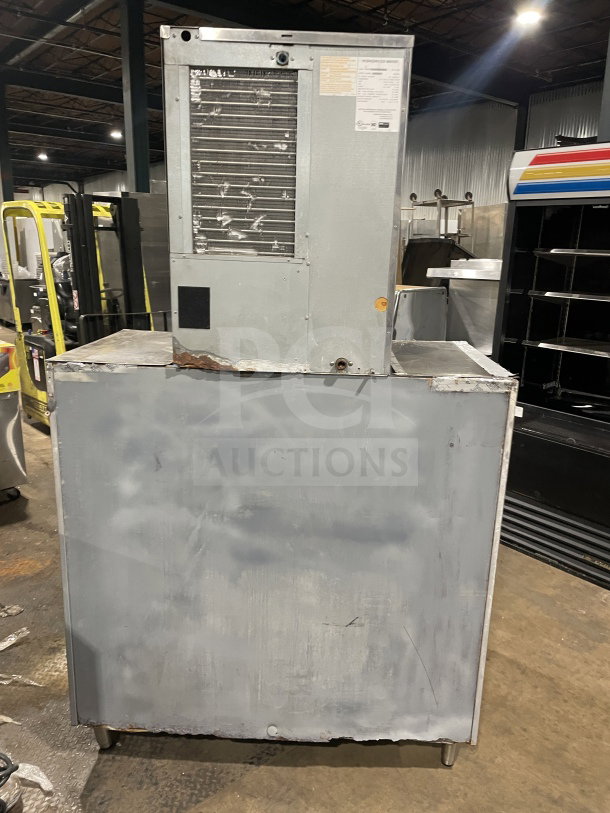 Hoshizaki KM-515MAH commercial ice machine, stainless steel, air-cooled, electric, on legs, 115-120V, used condition.