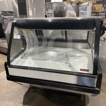Tor-Rey 57" commercial deli merchandiser, model TEC13OL UL, curved glass, 2-tier, rear sliding doors, on legs, 120V.