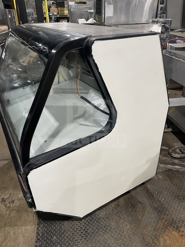 Tor-Rey TEC13OL UL white 57" curved glass deli merchandiser, 2-tier, rear double sliding doors, 120V, on legs, commercial use.