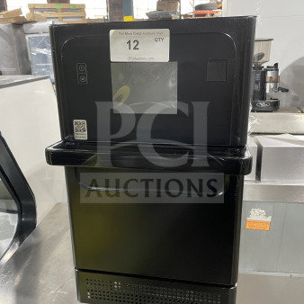 MerryChef Eikon E2S black electric countertop rapid cook oven, serial number 2205213093138; minor wear, auction tag visible.