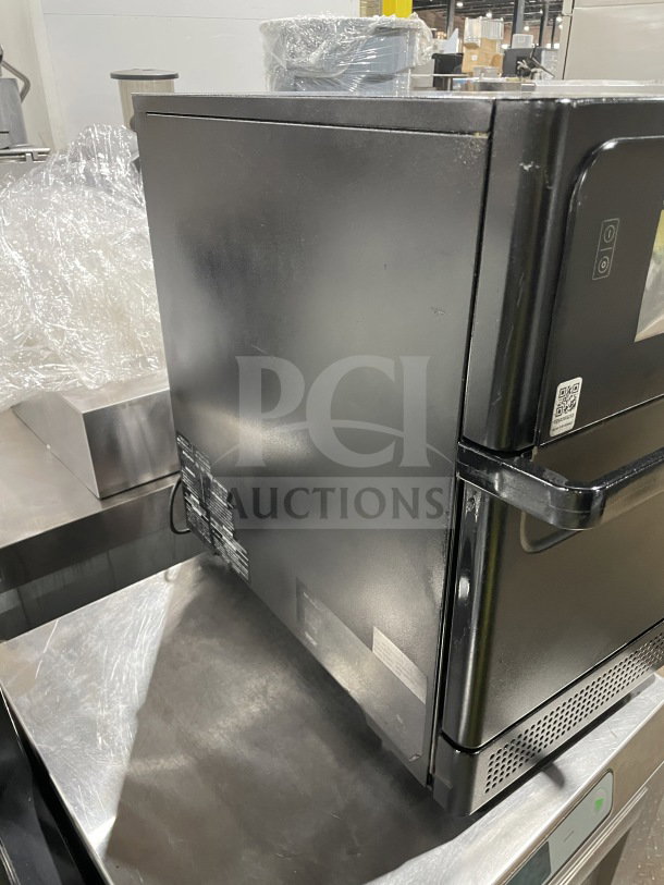MerryChef Eikon E2S commercial black electric rapid cook oven, gently used, showing serial number 2205213093138.