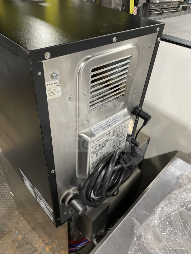 MerryChef Eikon E2S black countertop rapid cook oven, electric-powered, barely used condition with label details visible.