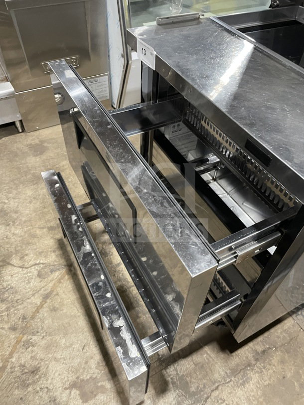 Turbo Air TST-28SD-D2-N stainless steel refrigerated prep table with 2 drawers, on casters, used condition, 115V.