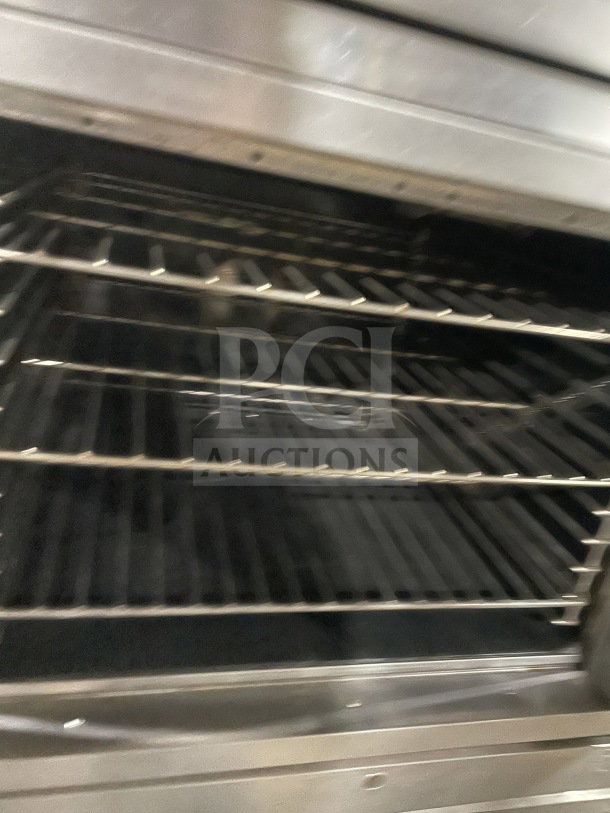 SunFire ICO E 10M stainless steel double-stacked convection oven, electric-powered, with wired oven racks, on legs.
