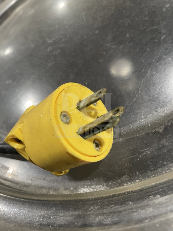 Yellow power plug of a Hobart commercial stainless steel electric potato peeler, SN: 3.0287.