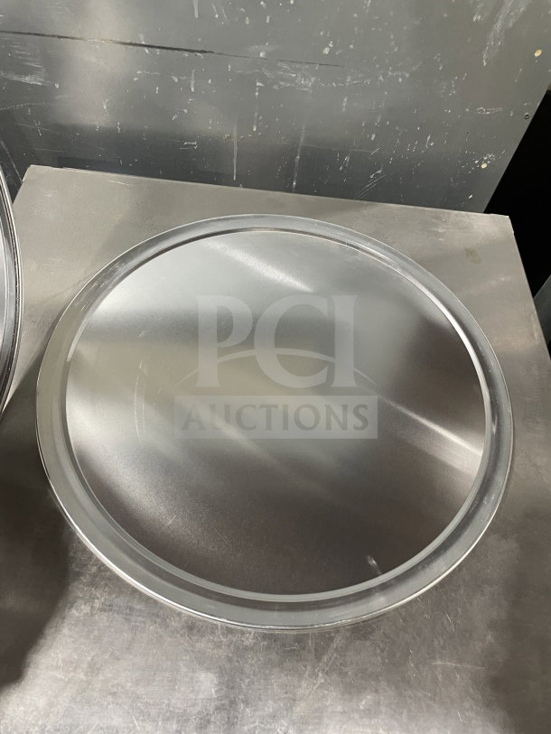 Thunder Group ALPTWR018 stainless steel pizza tray, commercial-grade, excellent condition, sleek finish.