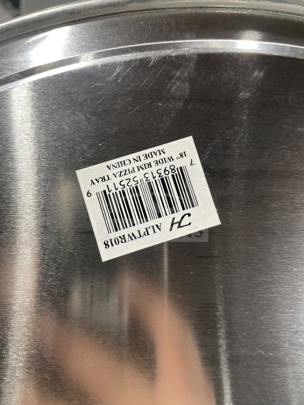 Thunder Group stainless steel pizza tray, model ALPTWR018, with 18" wide rim, barcode label shown.