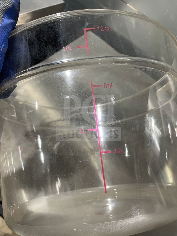 Clear 12-quart commercial polycarbonate food storage container with red measurement markings, excellent condition.